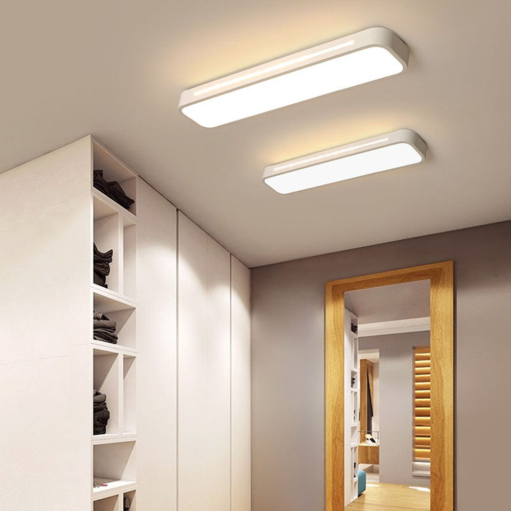 "Minimalist Nordic long LED ceiling light with sleek black finish and modern design for elegant interior lighting"