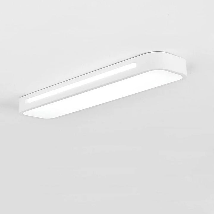 "Minimalist Nordic long LED ceiling light with sleek black finish and modern design for elegant interior lighting"