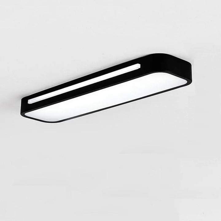 "Minimalist Nordic long LED ceiling light with sleek black finish and modern design for elegant interior lighting"