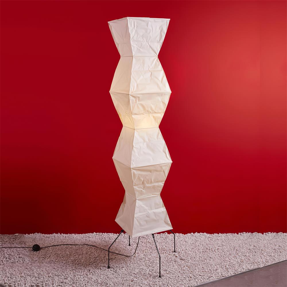 "Minimalist rice paper floor lamp with sleek metal frame and soft diffused light, perfect for creating a warm ambiance."