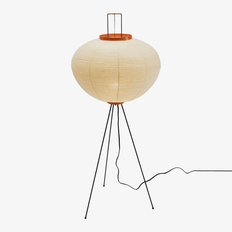 "Minimalist rice paper floor lamp with sleek metal frame and soft diffused light, perfect for creating a warm ambiance."