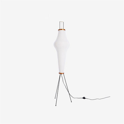 "Minimalist rice paper floor lamp with sleek metal frame and soft diffused light, perfect for creating a warm ambiance."