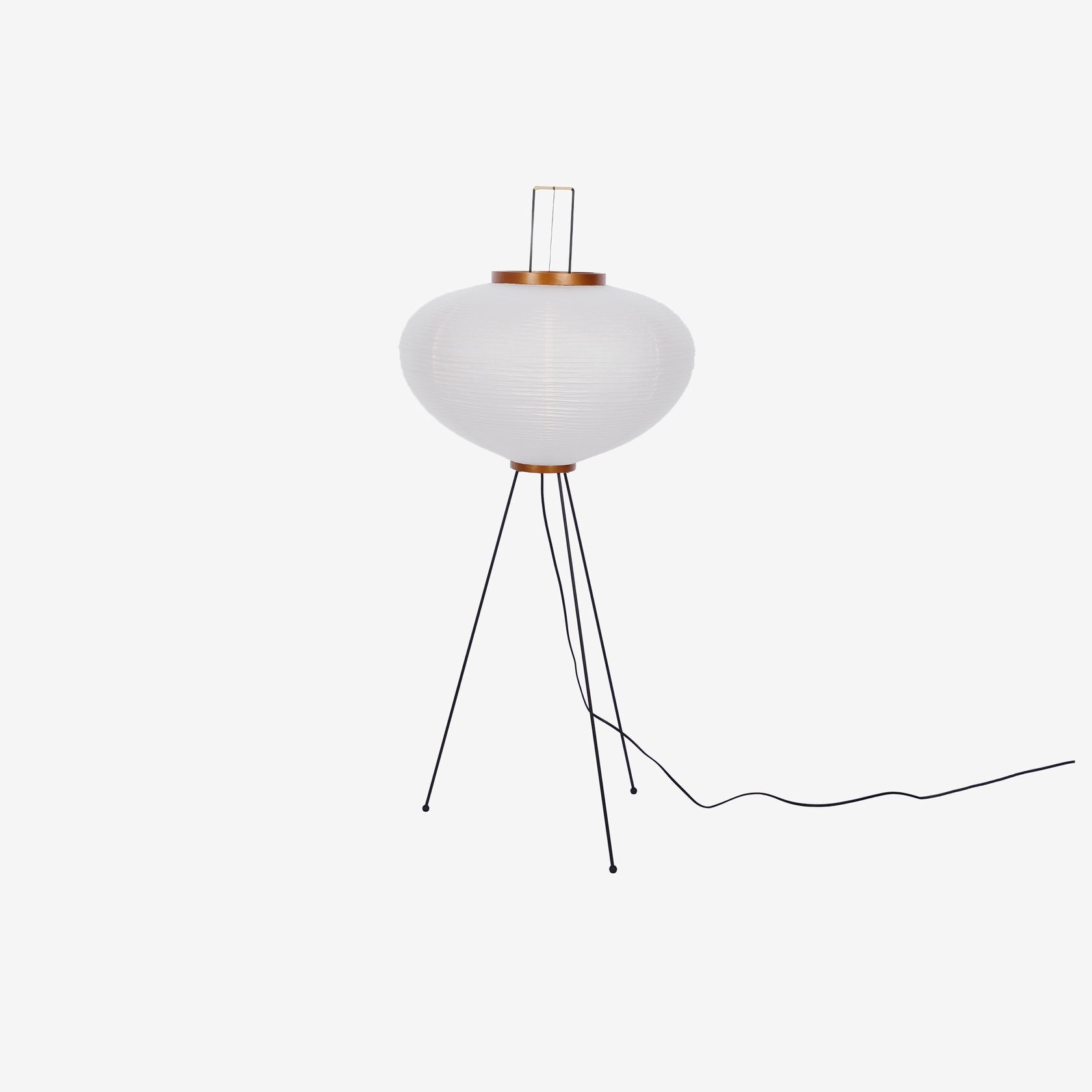 "Minimalist rice paper floor lamp with sleek metal frame and soft diffused light, perfect for creating a warm ambiance."