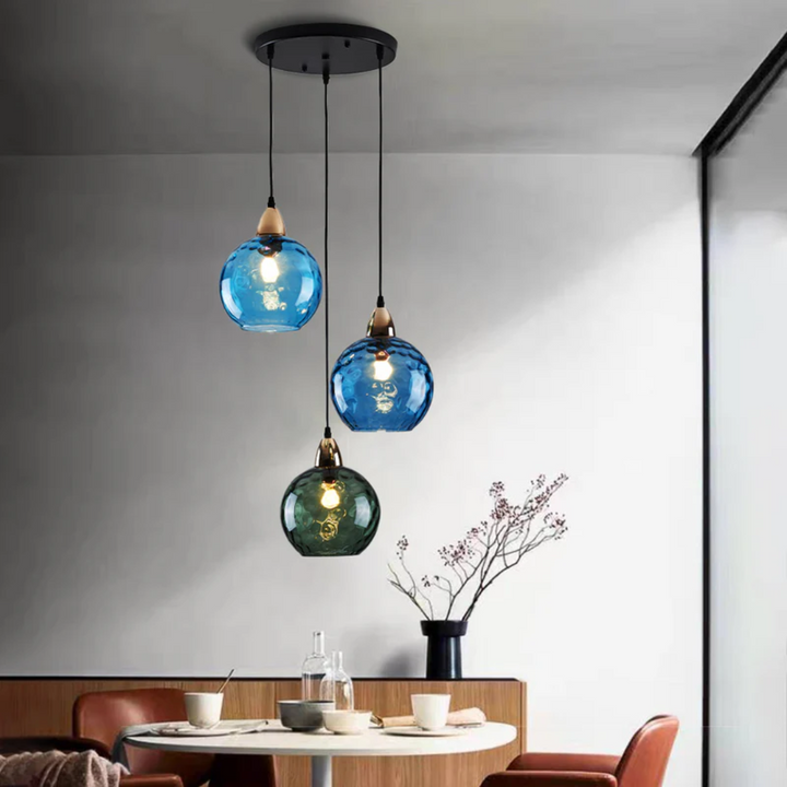 Modern adjustable 3-light cluster pendant lamp for flexible room lighting.