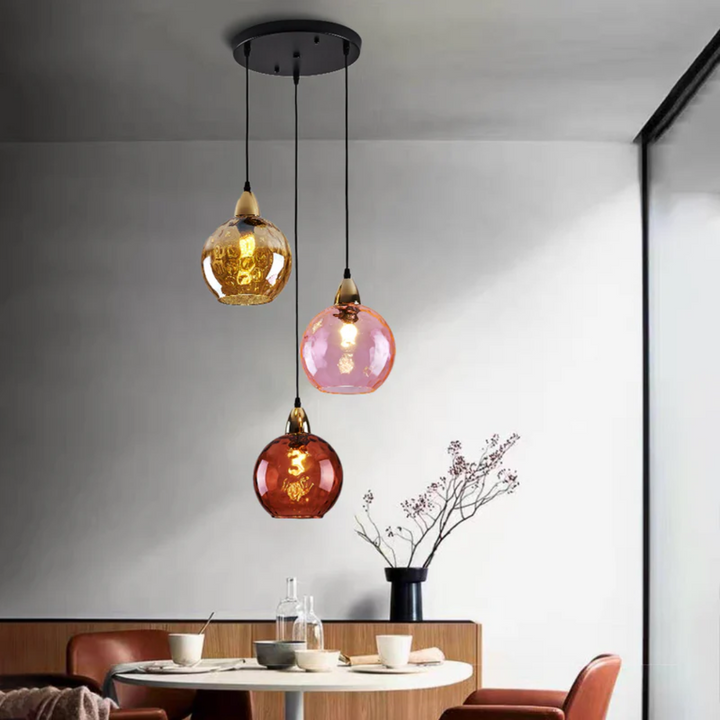 Contemporary 3-light pendant, an energy-efficient LED fixture for modern homes.