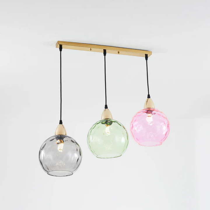 Unique 3-light pendant lamp, adding modern lighting to any interior design.