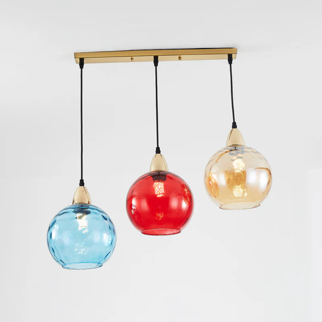 Contemporary 3-light cascade design pendant, enhancing home decor.