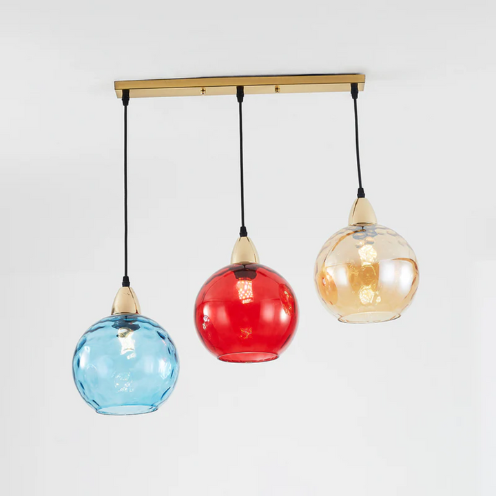 Contemporary 3-light cascade design pendant, enhancing home decor.