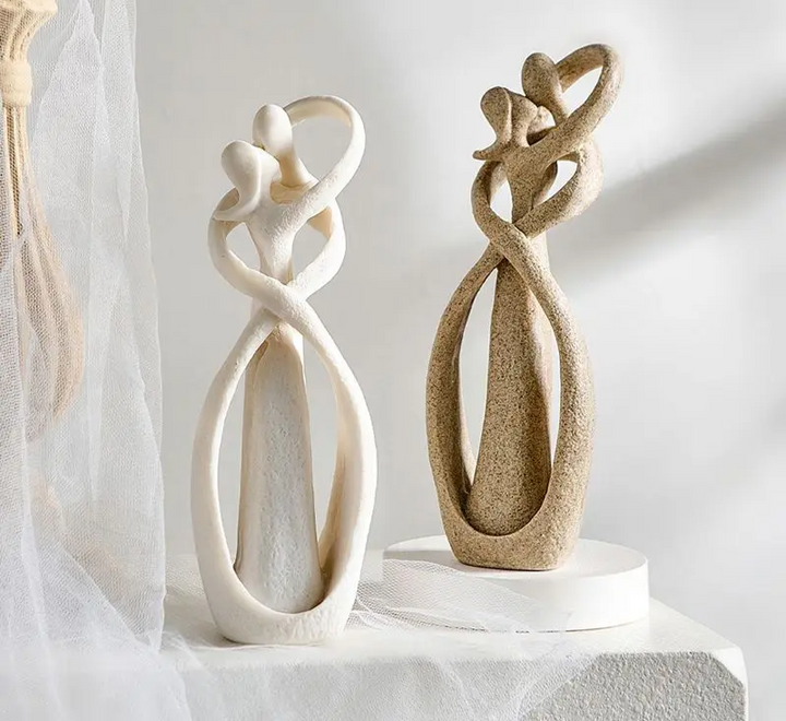 Modern abstract love sculpture figurine, perfect for contemporary home decor & shelf accent.