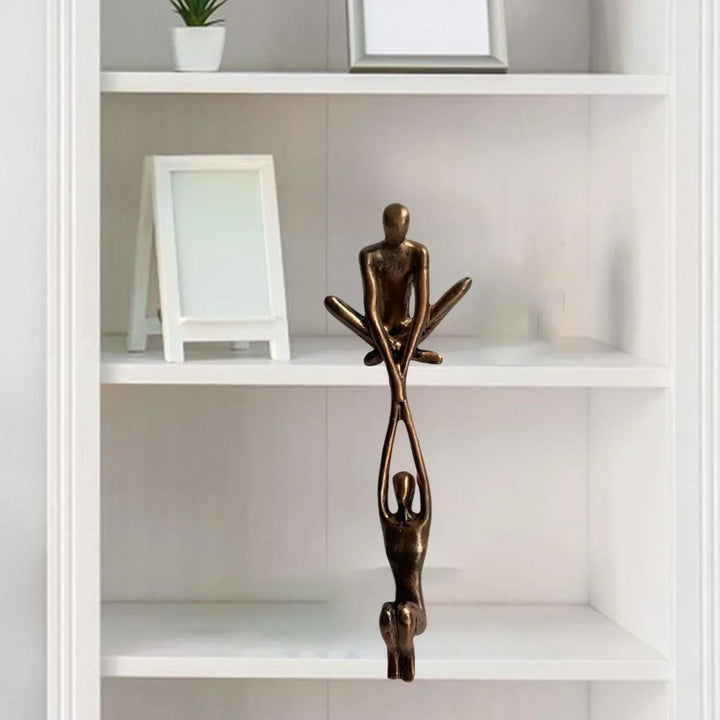Abstract modern figurine, an elegant accent for tabletop decor. Represents eternal love and strength.