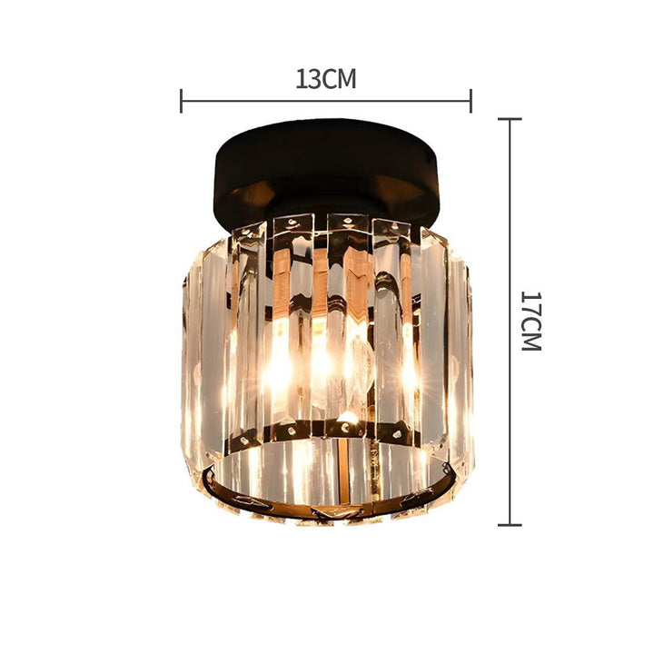 Modern black crystal flush mount ceiling light, sleek brass fixture, crystal shade, ideal for rooms with low ceilings.