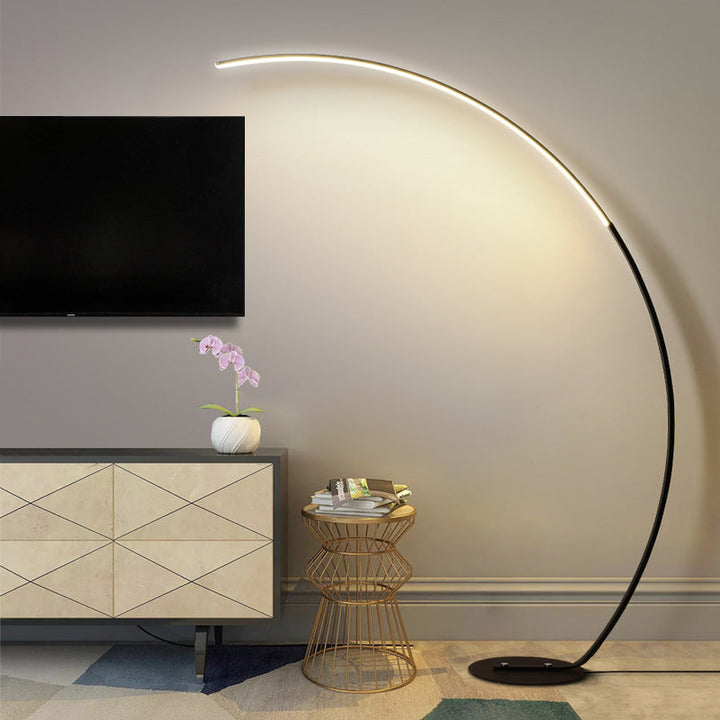 Modern black LED floor lamp with a curved structure, matte finish, and sleek design; perfect for home lighting decoration.