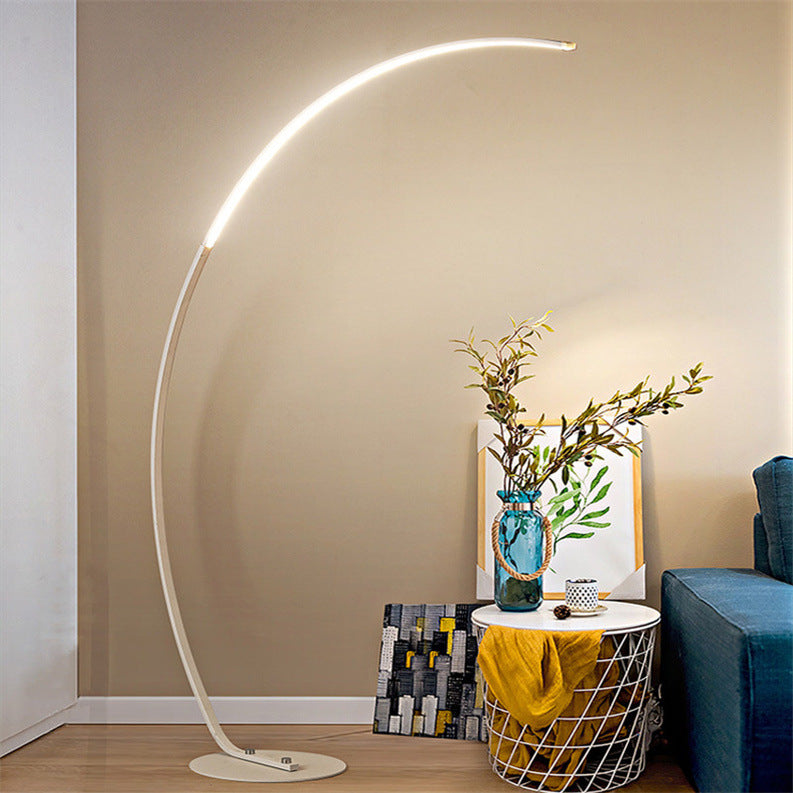 Modern black LED floor lamp with a curved structure, matte finish, and sleek design; perfect for home lighting decoration.