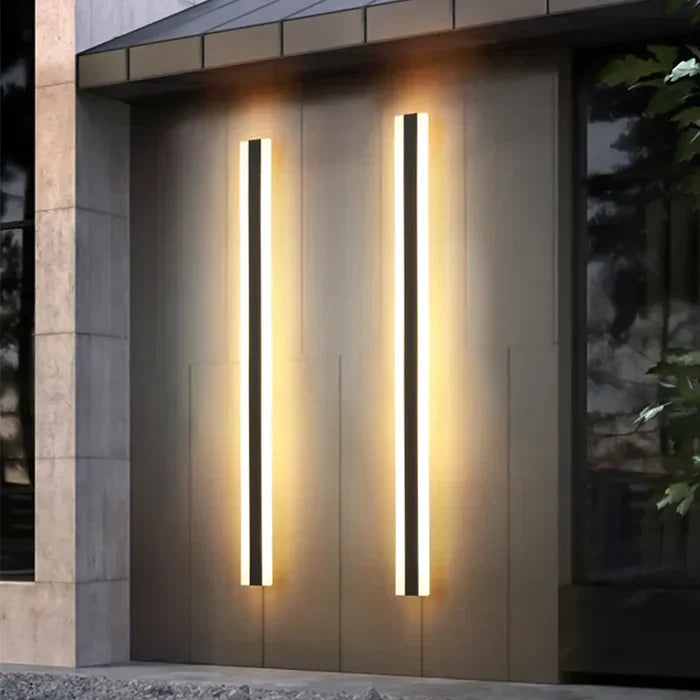 Modern black LED outdoor wall lamp, weather-resistant exterior lighting for patio or garden. Energy-efficient home accent.