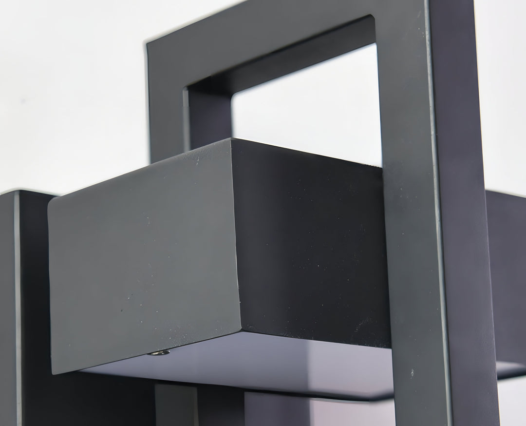 Modern black outdoor wall light with stainless steel finish, sleek design, perfect for enhancing exterior ambiance.