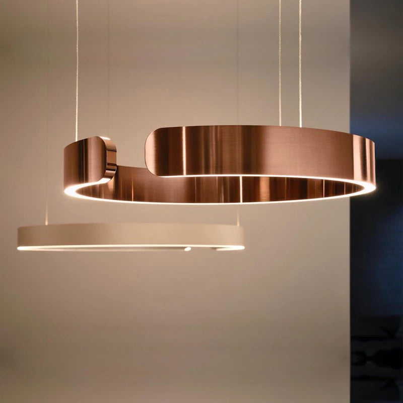 "Modern circular LED pendant light in minimal design, black finish, ideal for elegant home interiors and efficient lighting."