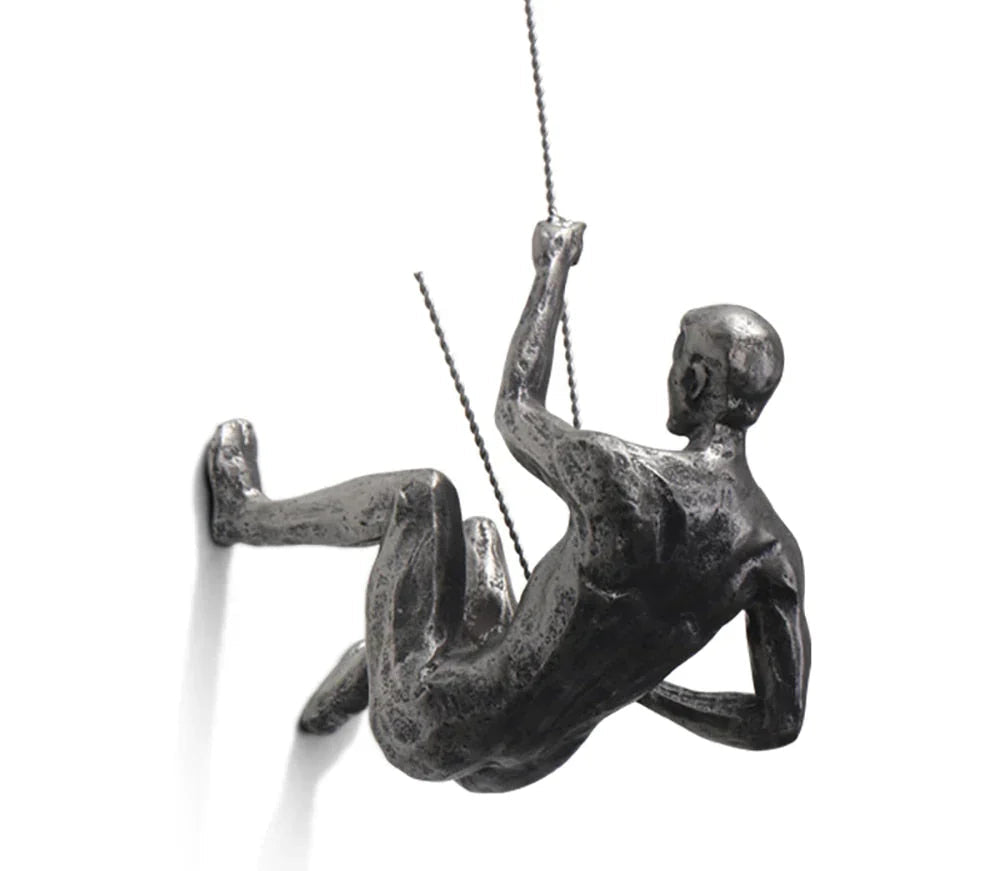 Modern climber wall art sculpture. Unique home & office decor, inspiring dynamism & strength.