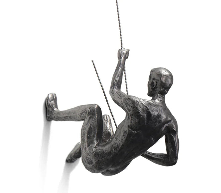 Modern climber wall art sculpture. Unique home & office decor, inspiring dynamism & strength.