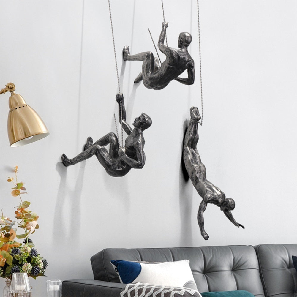 Dynamic modern climber wall sculpture. Unique artistic decor for inspiring contemporary homes & offices.