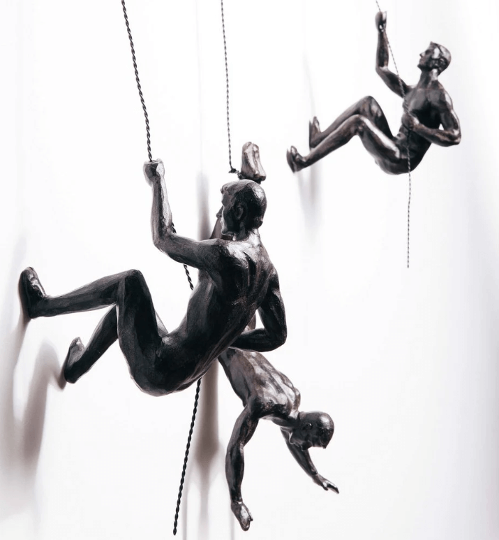 Inspirational climber wall sculpture. Modern art decor, perfect for office or home settings.