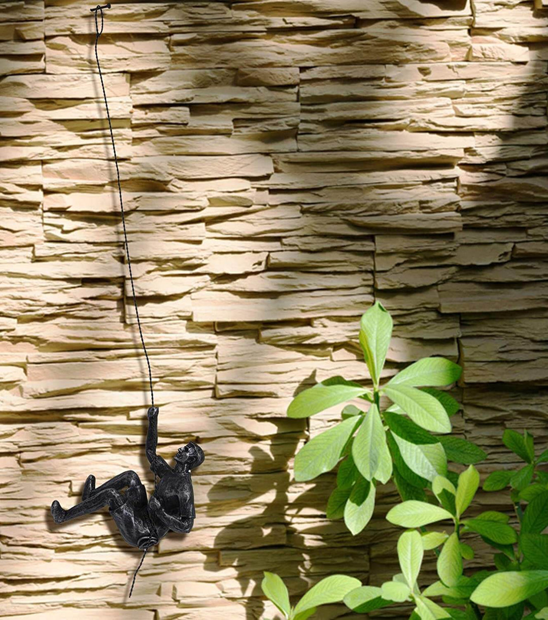Unique metallic climber wall art, a modern sculpture for striking home or office decoration.