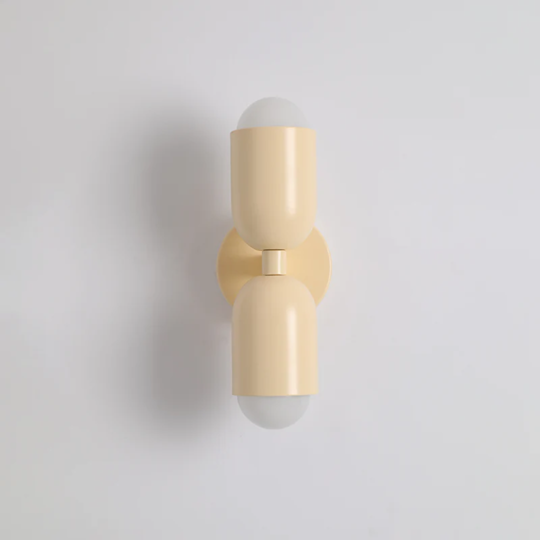 Modern Colorwave dual-sided LED wall lamp. Vibrant accent lighting for contemporary living room decor.