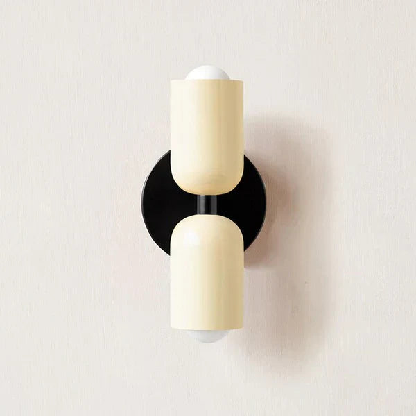 Modern dual LED wall lamp, adjustable, providing ambient home lighting.