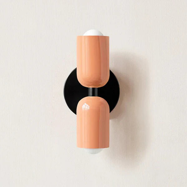 Dual LED wall lamp with up/down lighting, enhancing contemporary spaces.