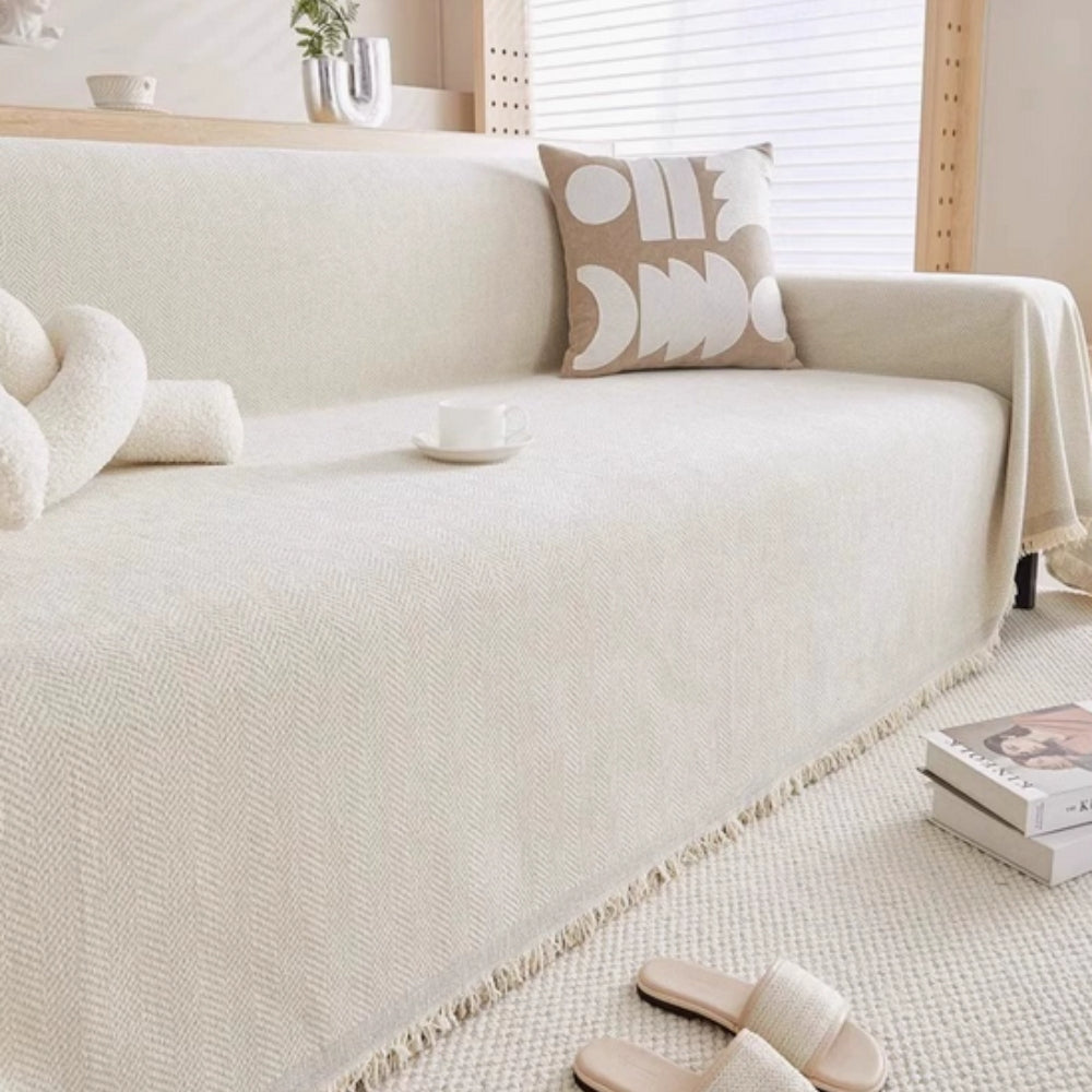 Cozy knit modern throw blanket, perfect for minimalist living room and sofa decor.