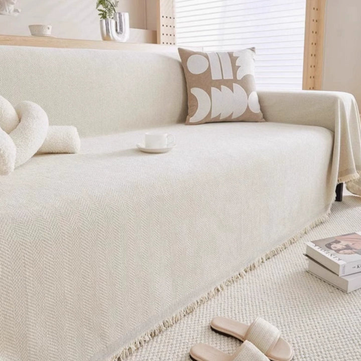 Cozy knit modern throw blanket, perfect for minimalist living room and sofa decor.