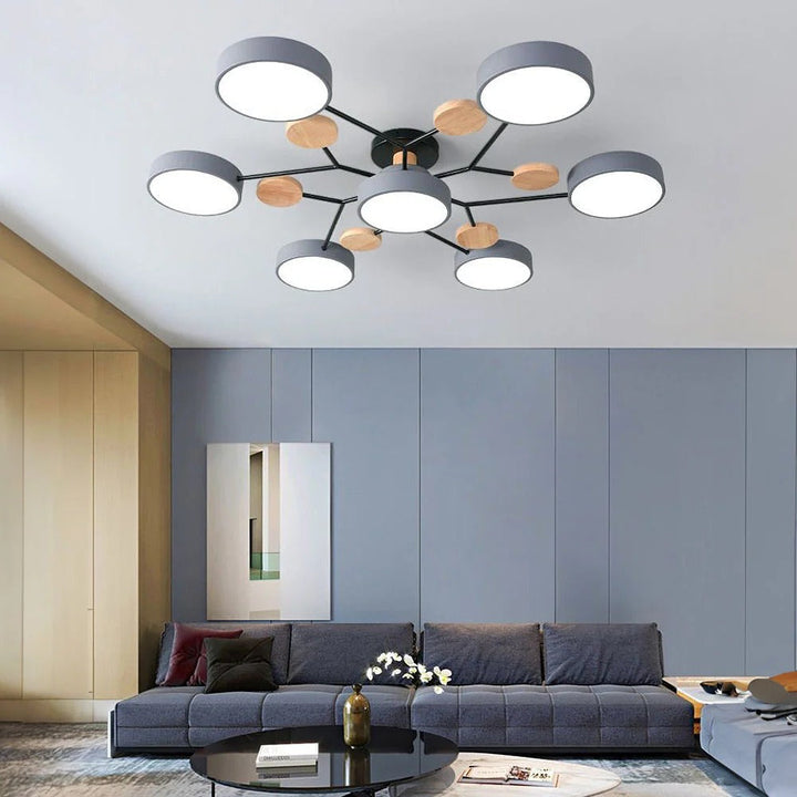 Modern LED ceiling light chandelier with sleek, minimalist design; iron and acrylic materials illuminate living rooms.