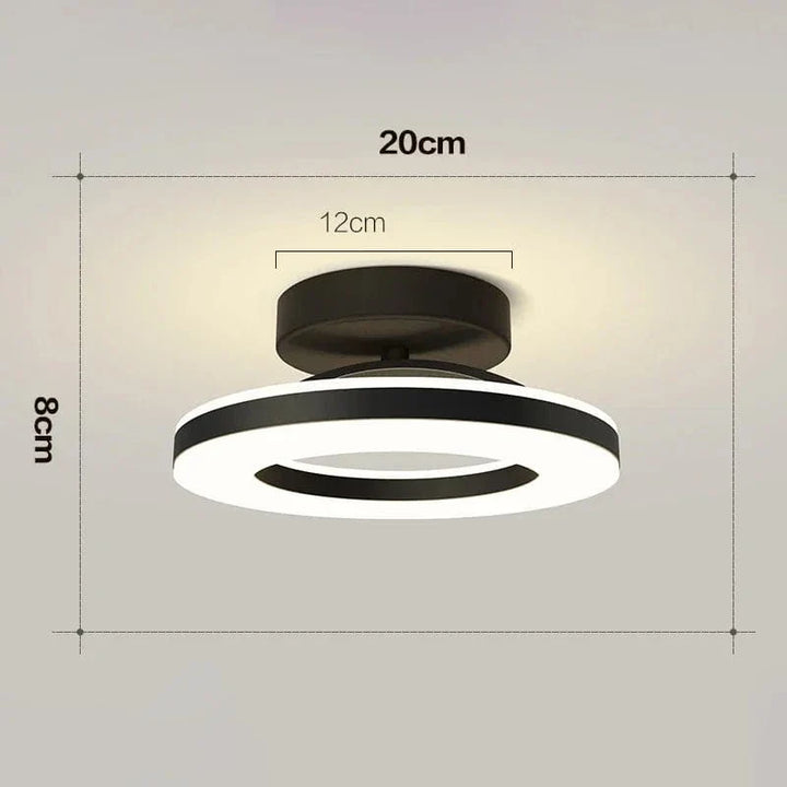 "Modern LED ceiling light with adjustable colors, sleek design, gold and black finish, perfect for contemporary interiors."
