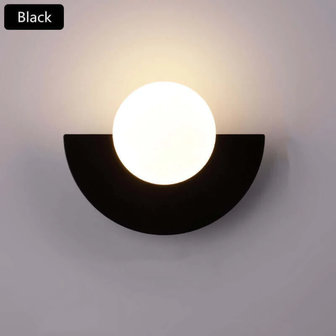 Artistic half moon metal wall lamp, LED powered. Adds a unique modern touch to interior home lighting.