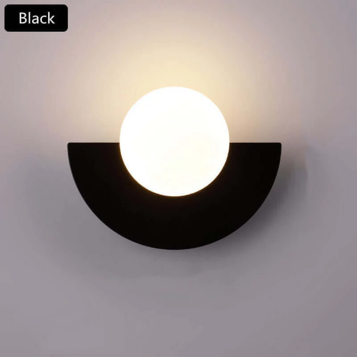 Artistic half moon metal wall lamp, LED powered. Adds a unique modern touch to interior home lighting.