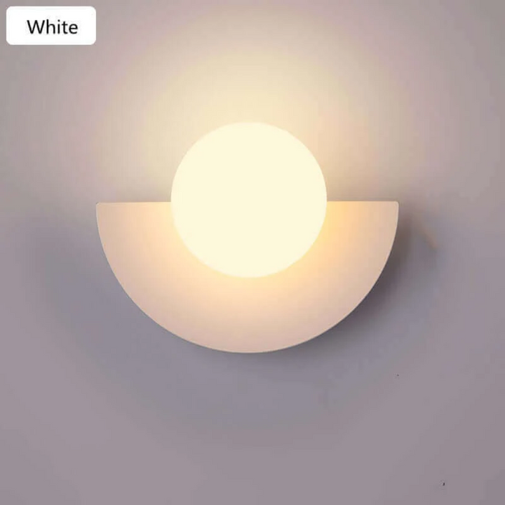 Elegant half moon LED wall lamp. Modern metal design for sophisticated home illumination & wall decor.