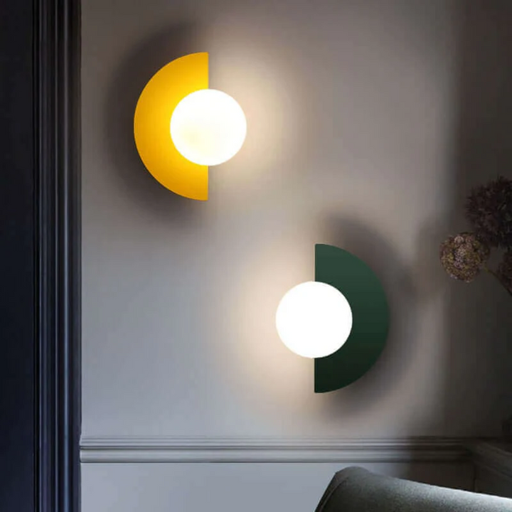 Chic metal half moon wall lamp. Modern LED lighting solution, ideal for upscale interior home decor.