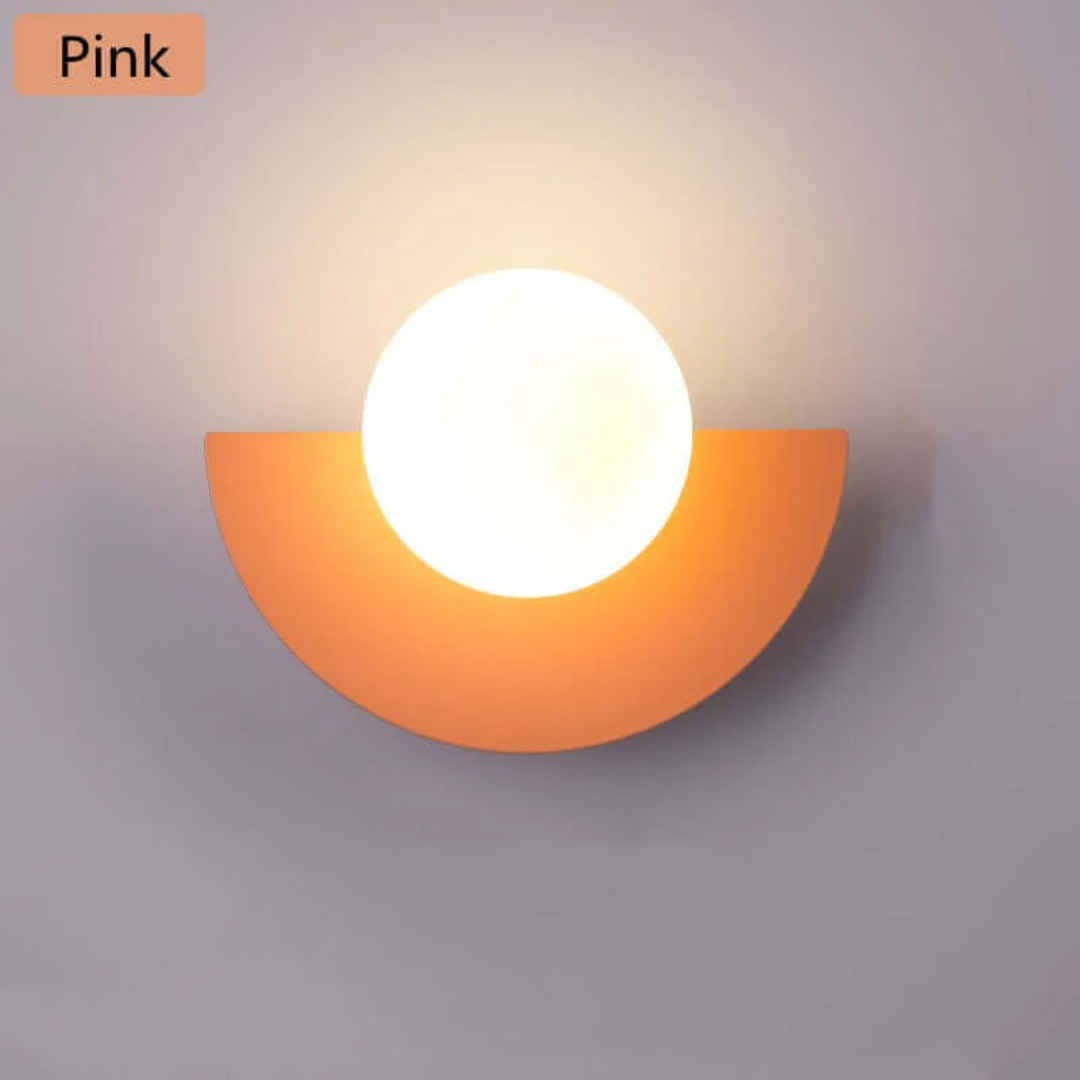 Contemporary metal half moon wall lamp with integrated LED. Enhance your modern interior design.