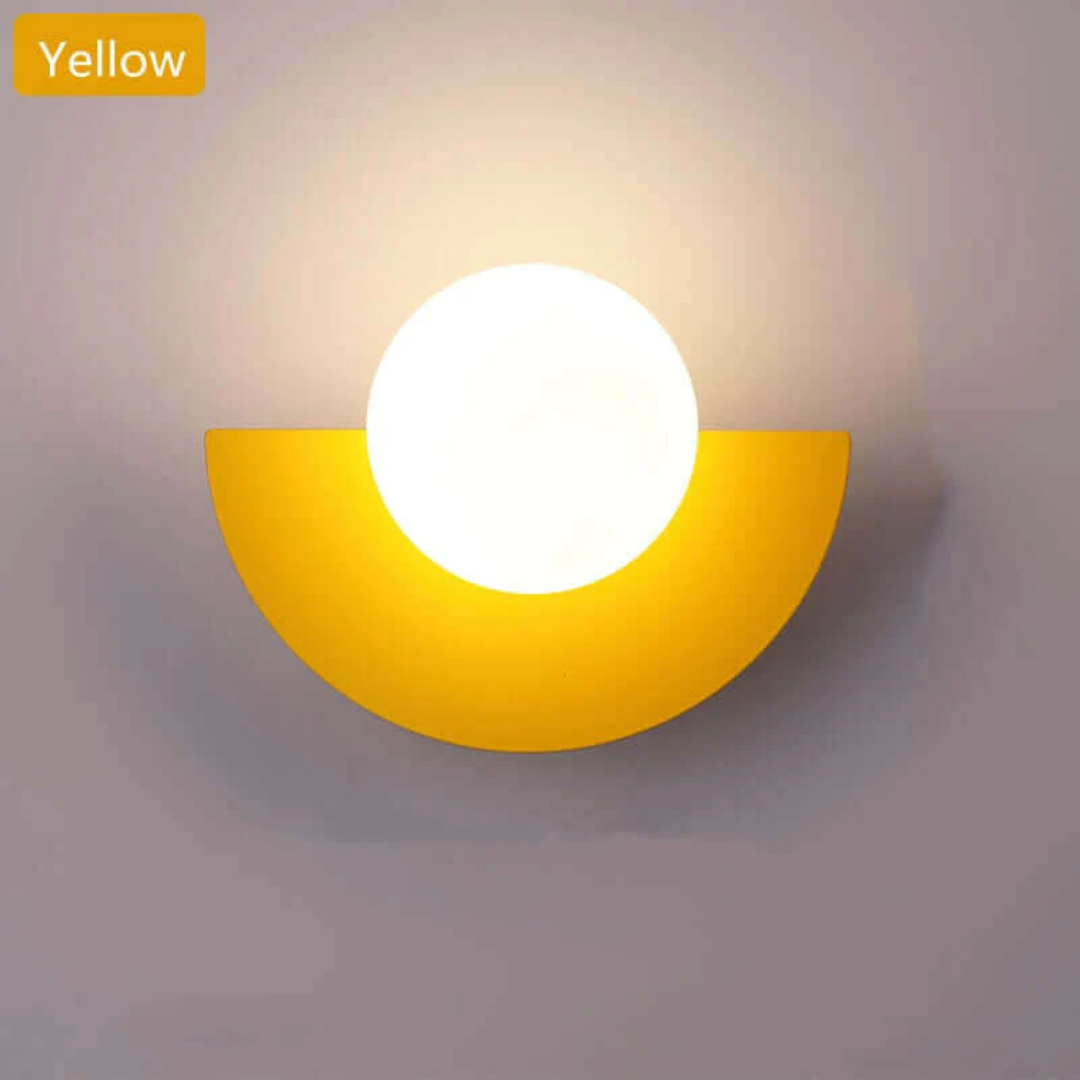 Soft glow LED half moon wall lamp. Modern metal design for elegant ambient room lighting & decor.