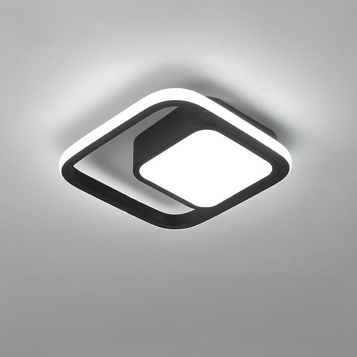 "Modern Minimalist Halo Duo Ceiling Light with a sleek, circular design providing warm, ambient LED illumination."