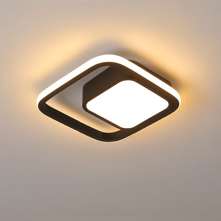 "Modern Minimalist Halo Duo Ceiling Light with a sleek, circular design providing warm, ambient LED illumination."