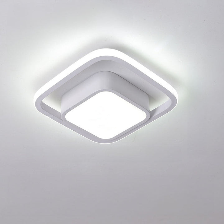 "Modern Minimalist Halo Duo Ceiling Light with a sleek, circular design providing warm, ambient LED illumination."