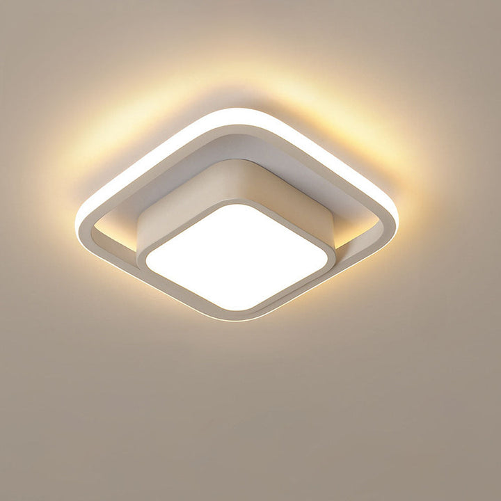 "Modern Minimalist Halo Duo Ceiling Light with a sleek, circular design providing warm, ambient LED illumination."