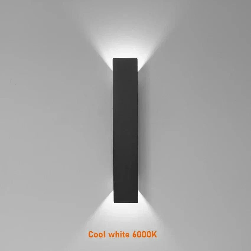 Modern outdoor LED wall light, black or white finish, IP65 waterproof, up/down lighting, enhances exterior decor.