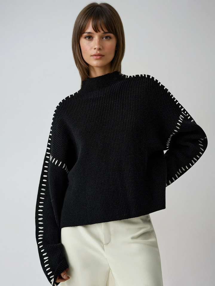Modern oversized mock neck sweater for women, perfect for casual chic winter fashion.