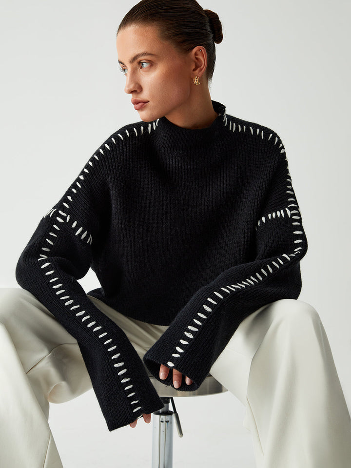 Warm oversized mock neck sweater, a cozy knit essential for women's winter fashion and casual outings.