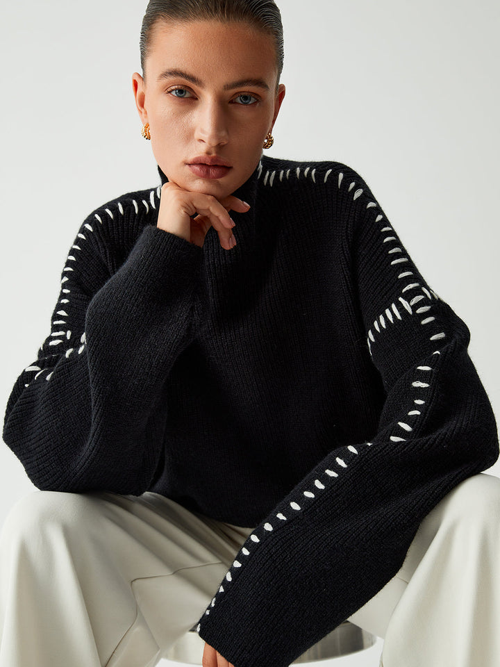 Versatile modern oversized mock neck sweater, perfect for women's casual chic looks and winter layering.