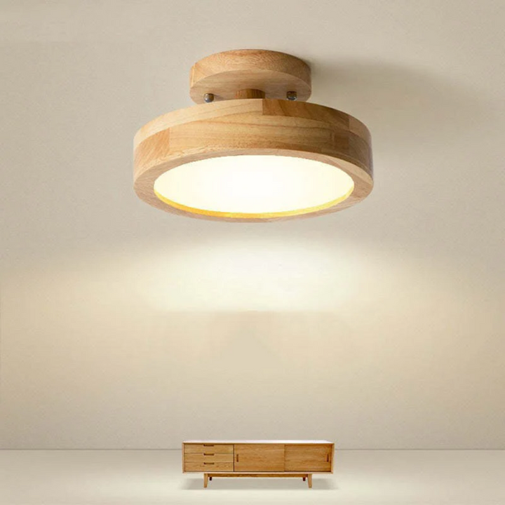 Round LED ceiling light, modern home decor accent with adjustable ambient lighting feature.