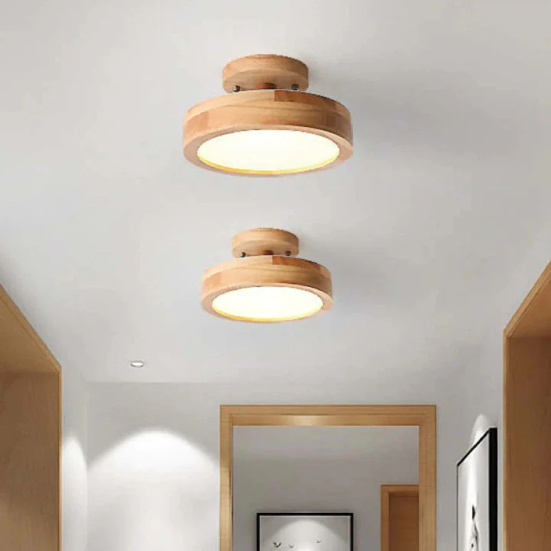 Easy-install modern round LED ceiling light fixture, adjustable ambiance for cozy home lighting.
