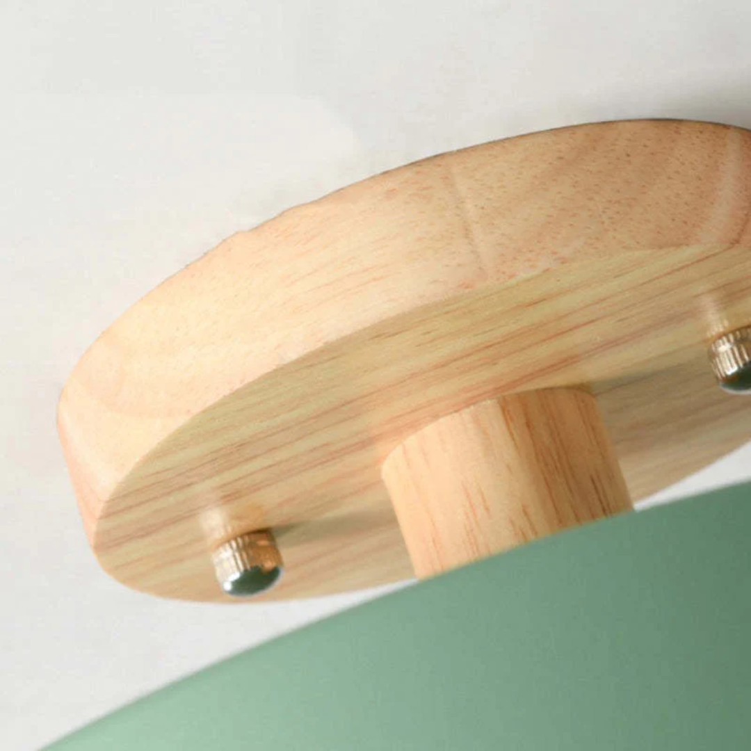 Energy-efficient round LED ceiling light, adjustable brightness for a comfortable bedroom ambiance.