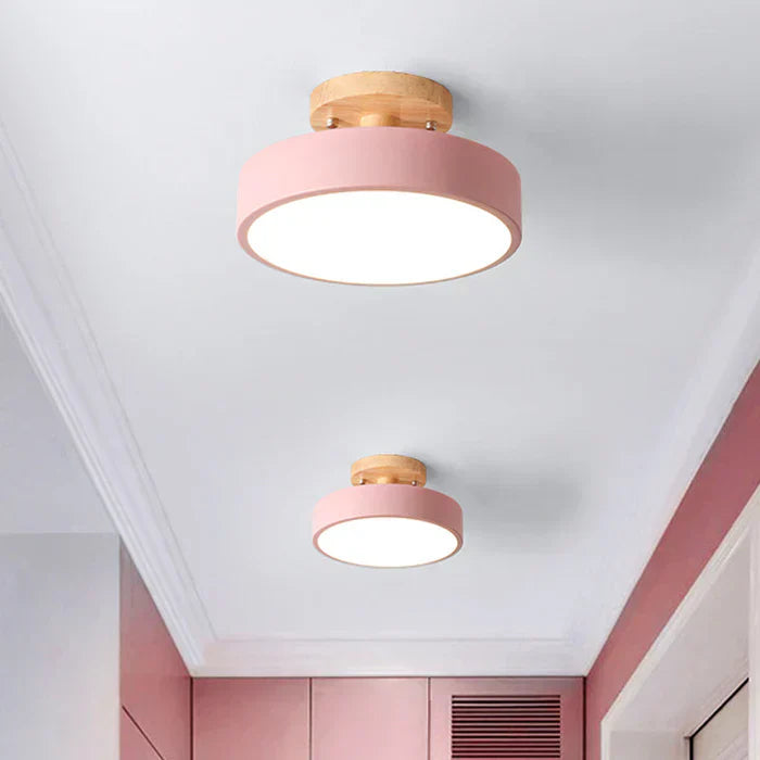 Energy-efficient LED ceiling lamp. Modern Scandinavian wood & metal fixture enhances home decor.